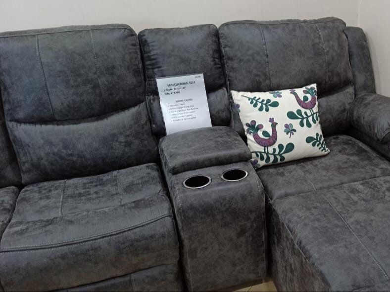 Miam charcoal grey L-shaped 6-seater sectional recliner.
